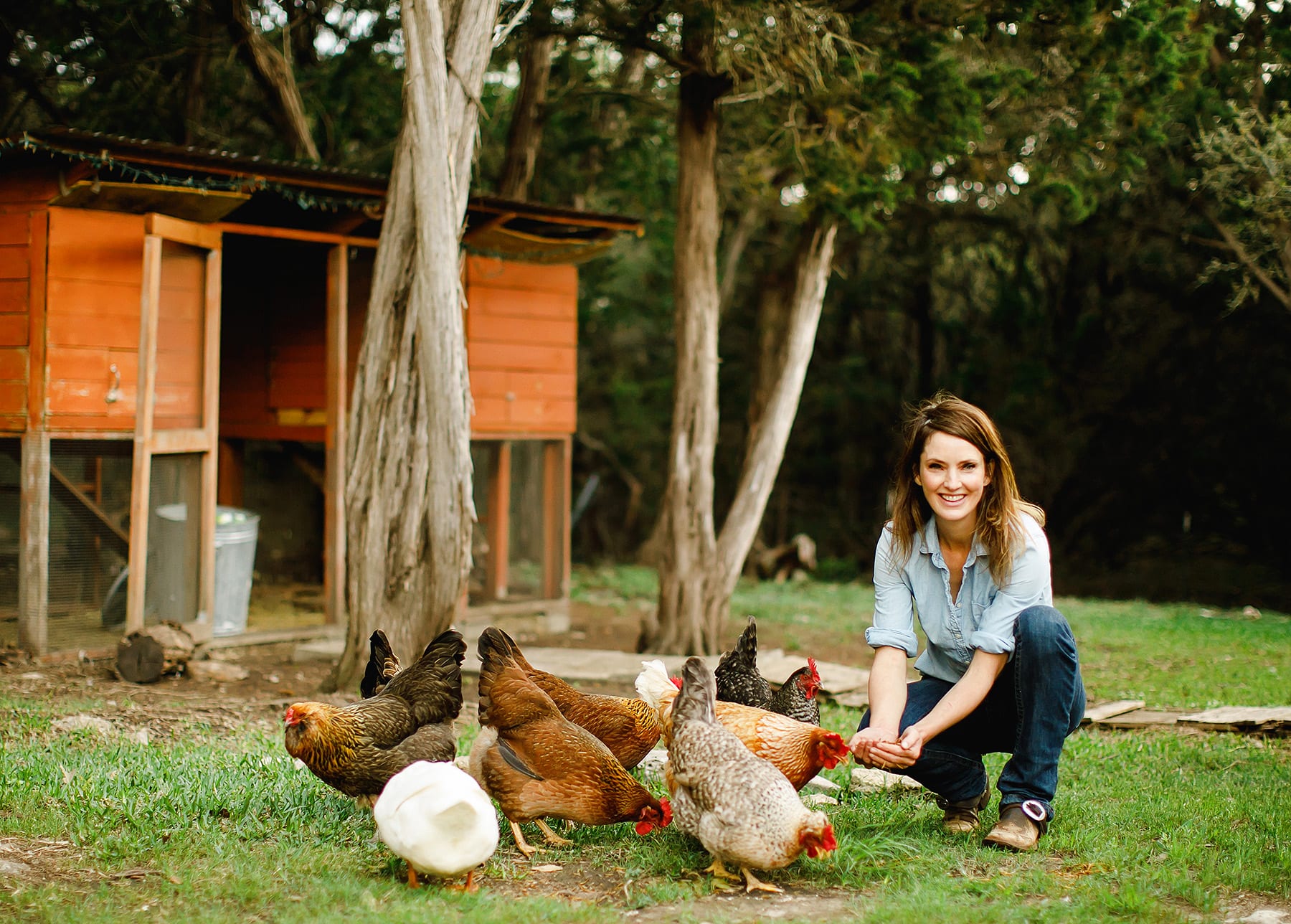 Sigrid and her chickens in Driftwood, Texas