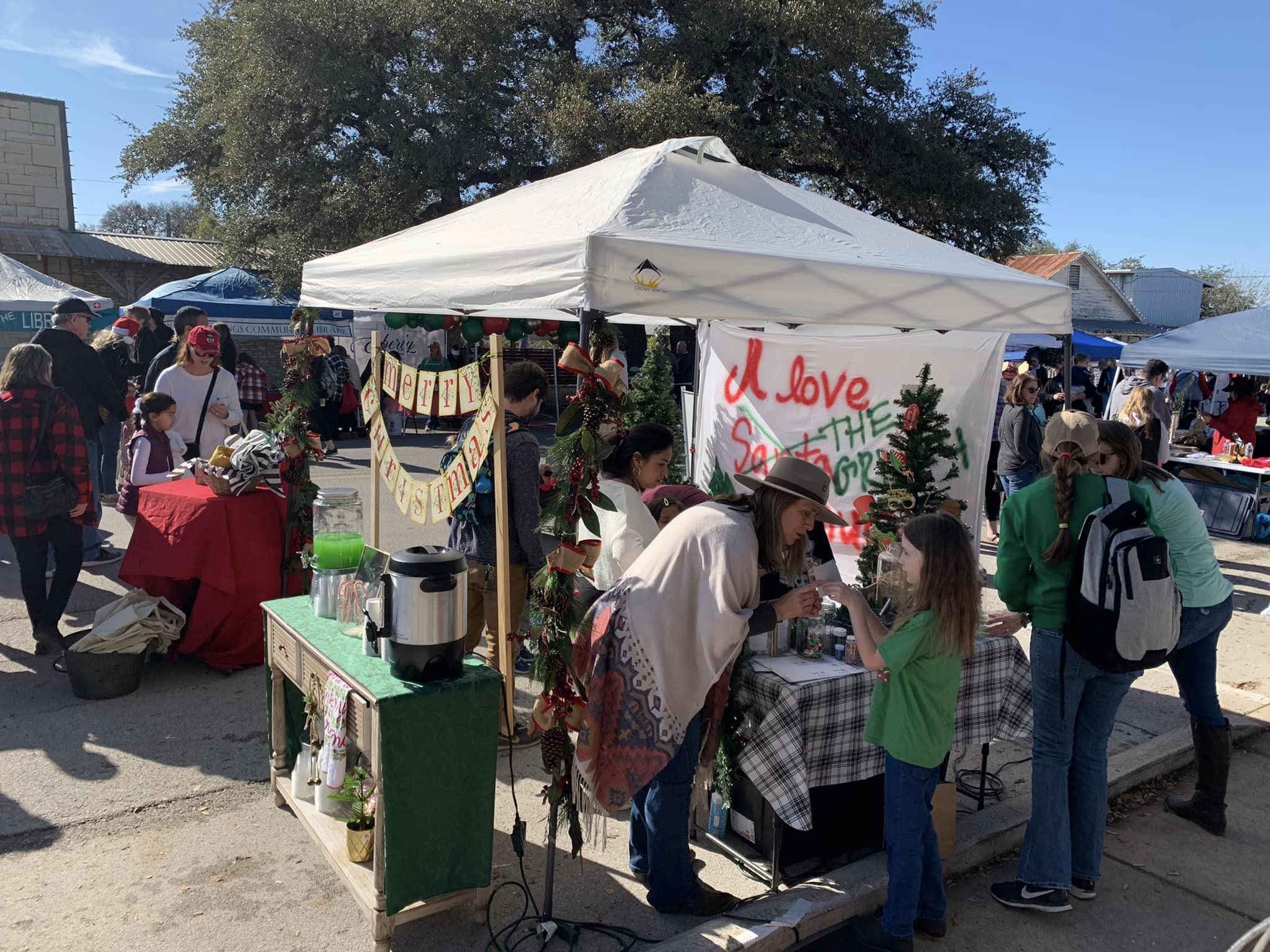 Magnolia Realty Austin Hill Country office with the Grinch booth for Christmas on Mercer Street 2022