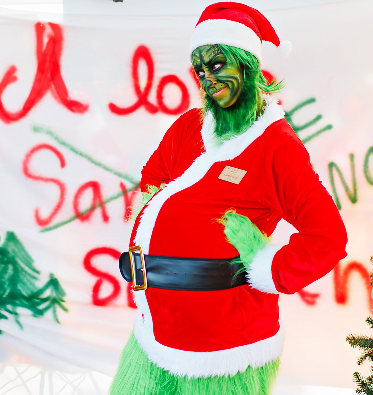 Lauren Clark with Magnolia Realty dressed up as the Grinch for Christmas on Mercer Street