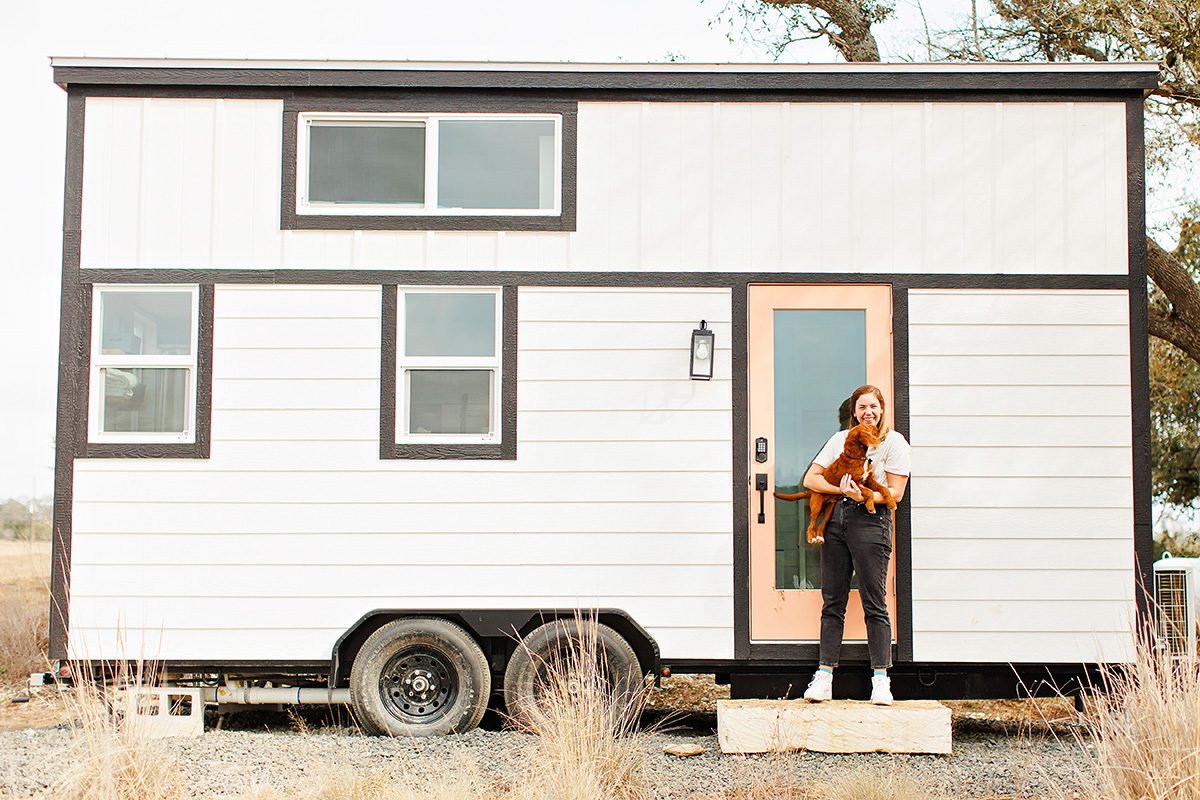 Emily Weyand, Dripping Springs High School math teacher, standing in front of her tiny house