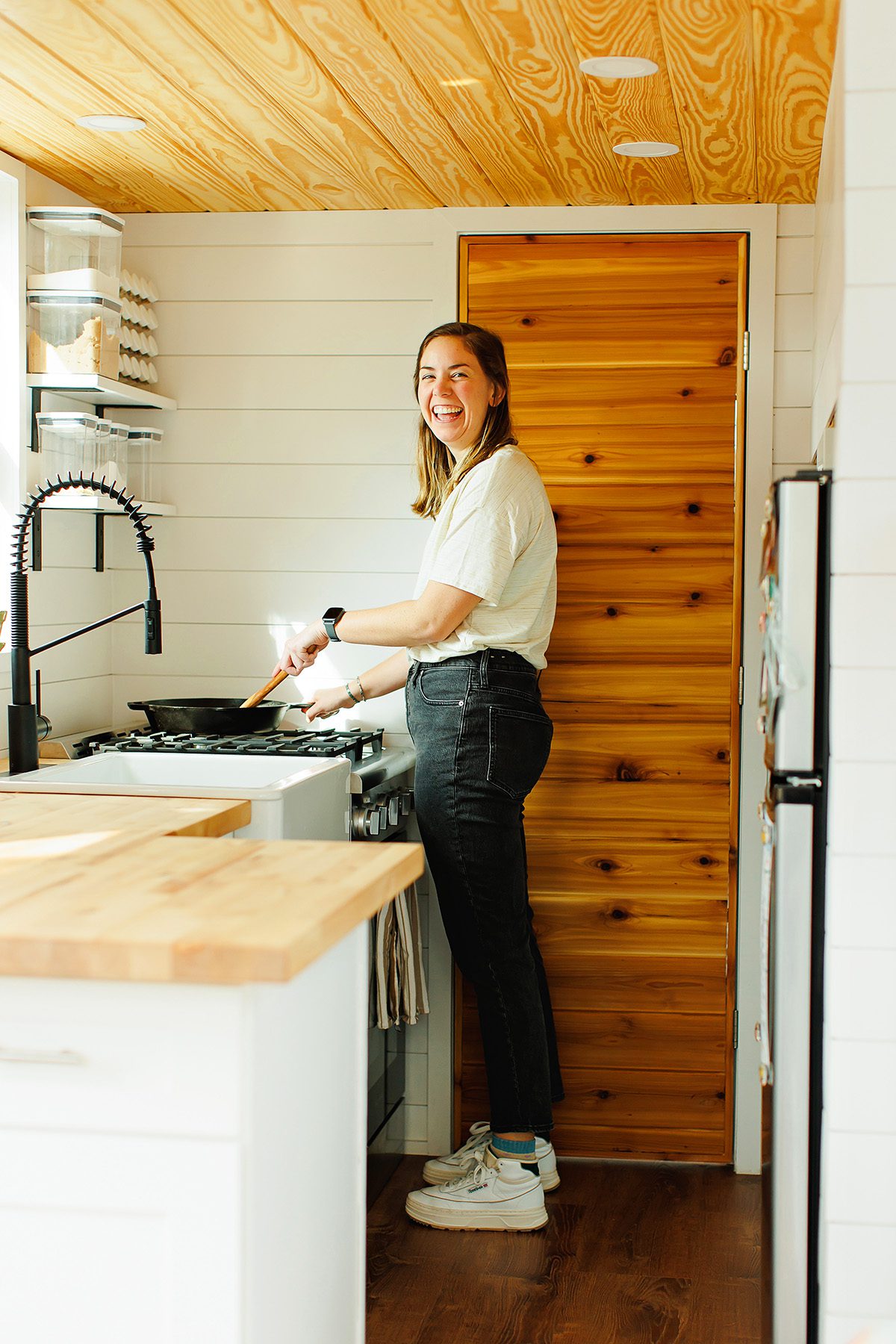Emily Weyand, Dripping Springs High School math teacher, cooking in her tiny house