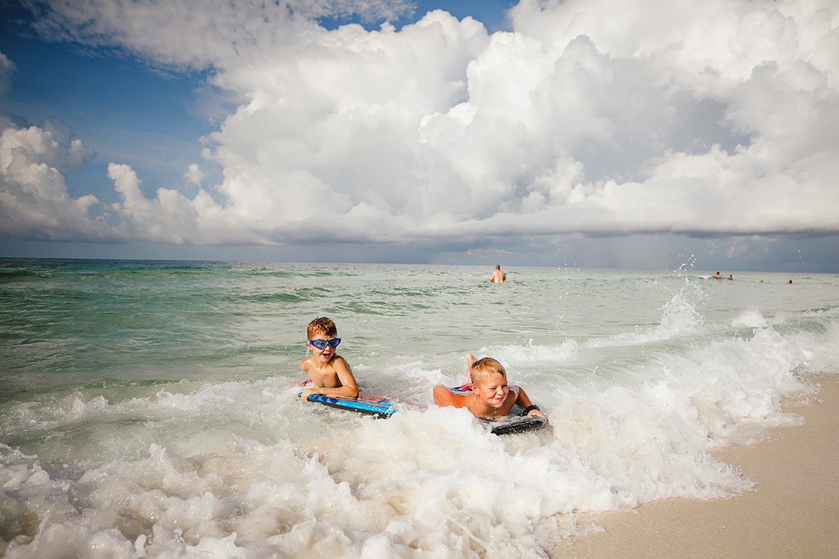 Kids boogie boarding in Florida