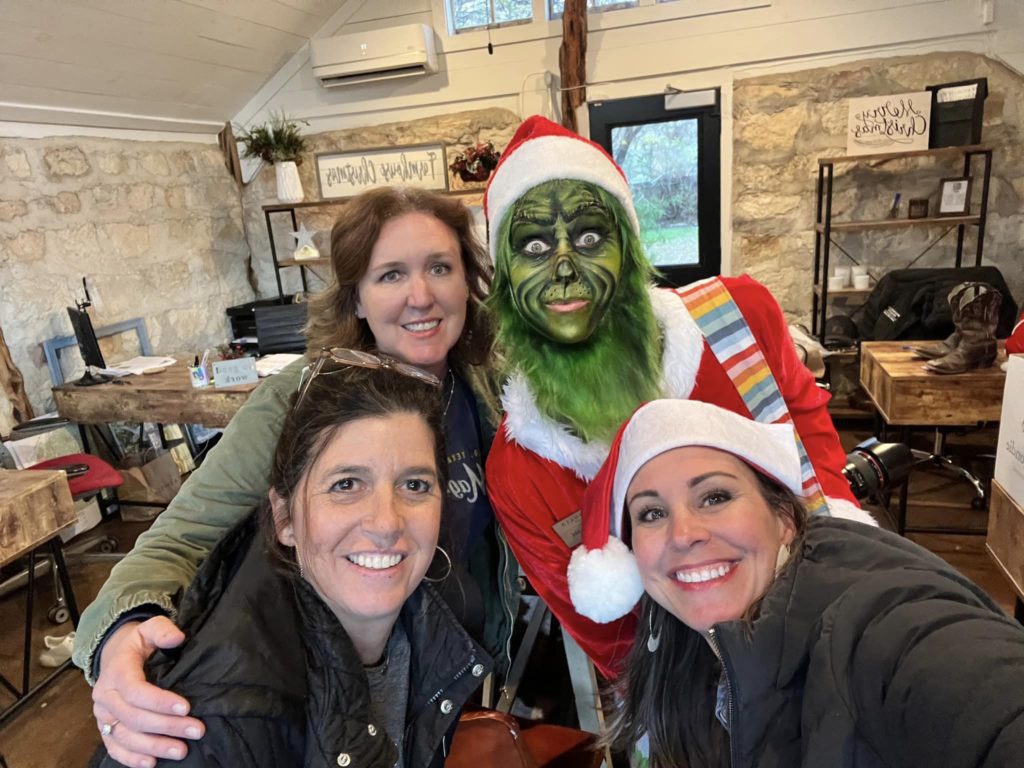 Magnolia Realty Austin Hill Country office with the Grinch for Christmas on Mercer Street 2022