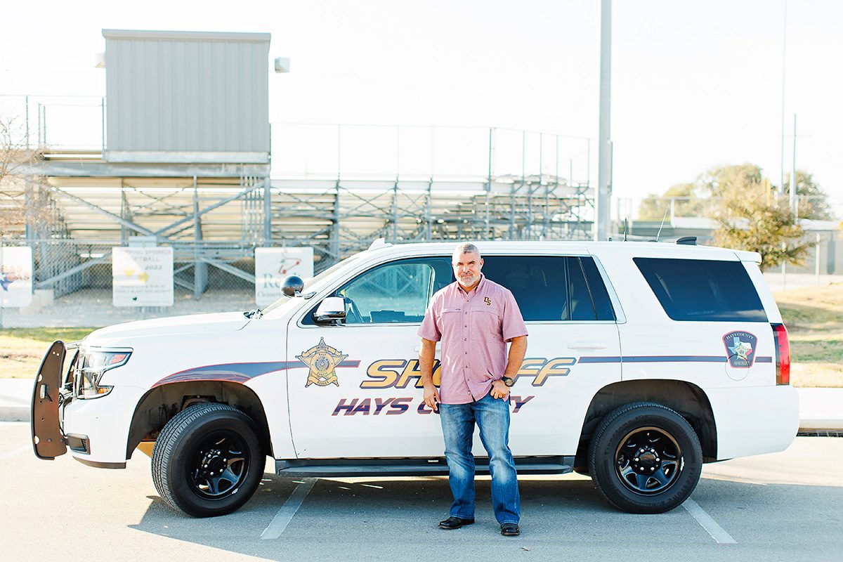 Hays County Sheriff Deputy Anthony Hipolito in patrol car