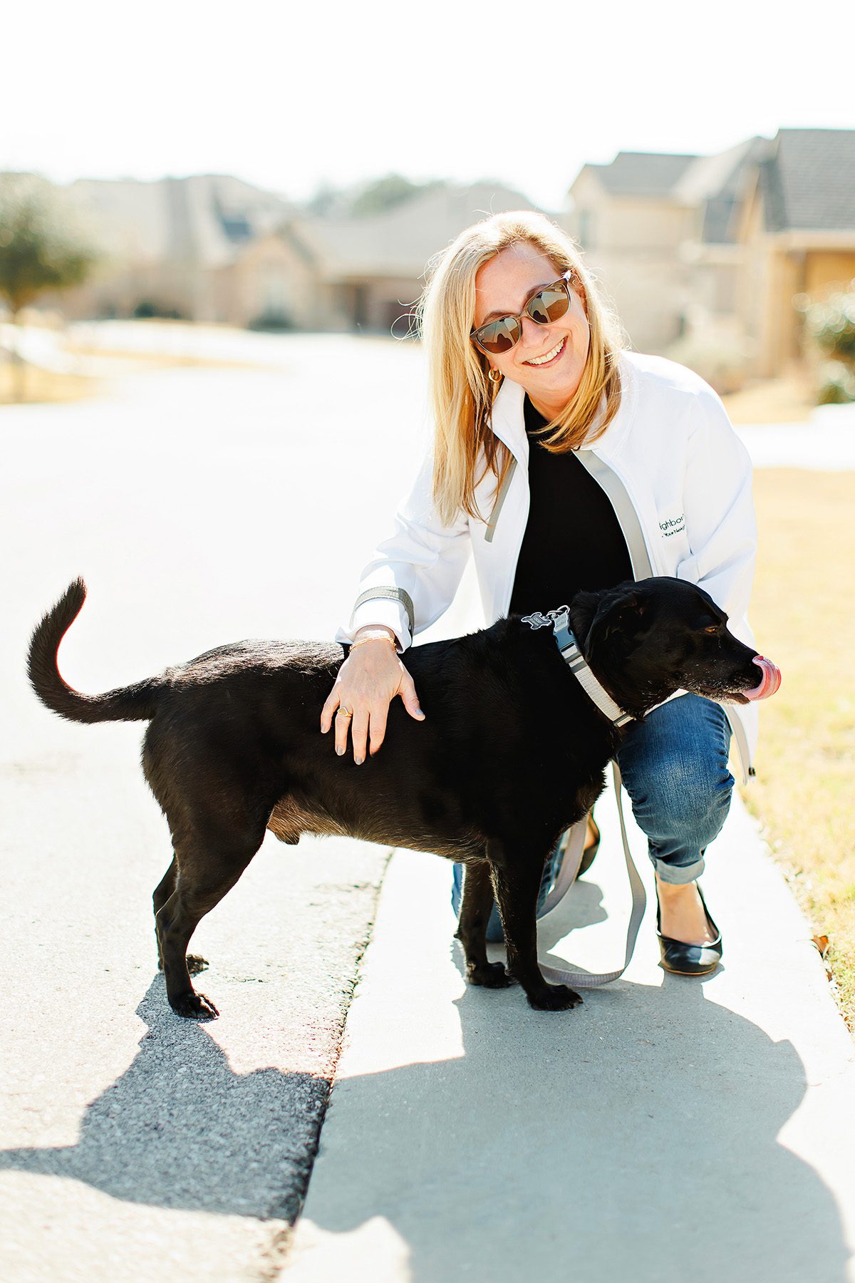 Fawn Crosby Dripping Springs lender with Neighborhood Loans walking her dog Clay