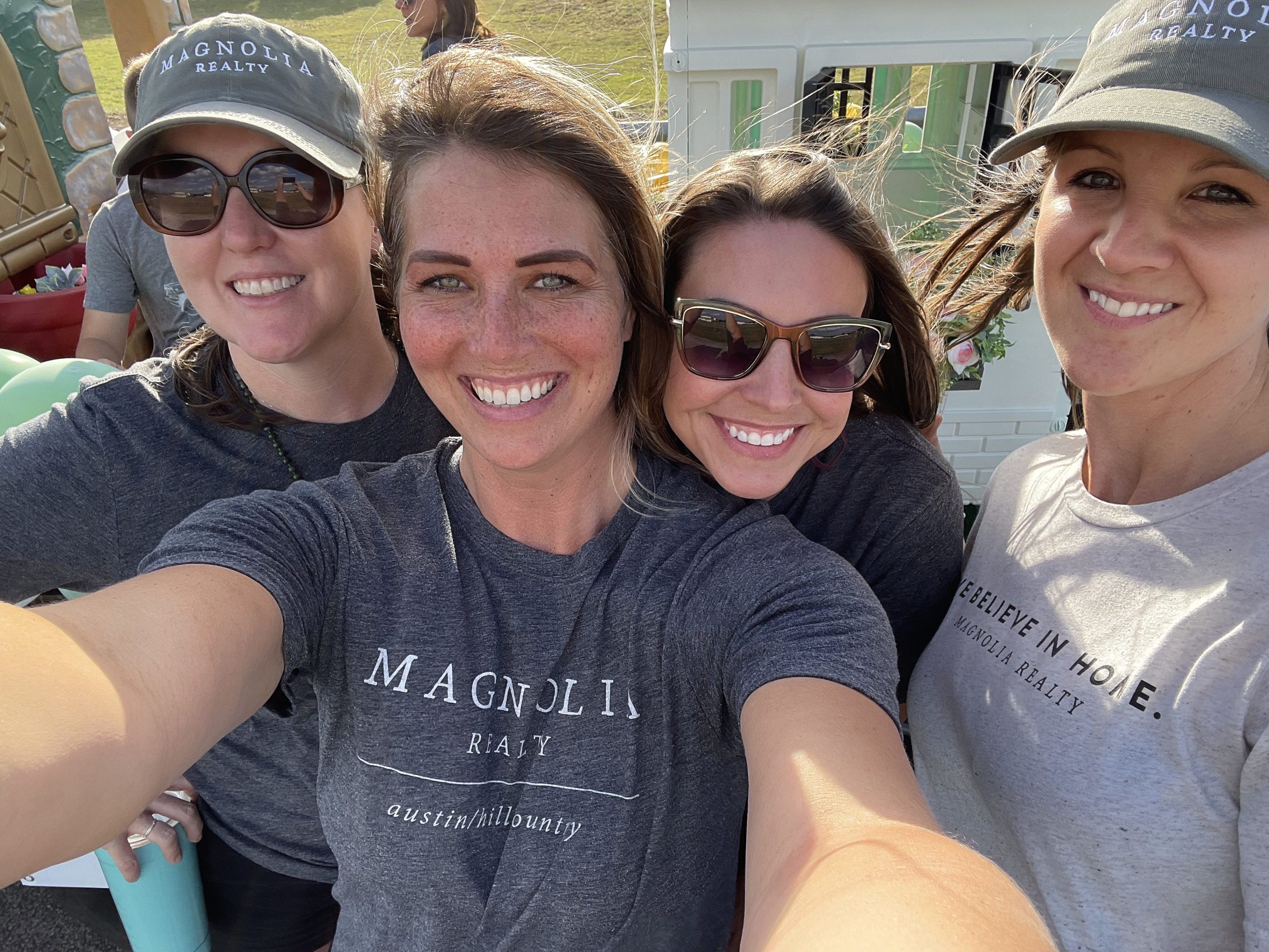 Heather Jones, Lauren Clark, Kristi Metcalf, Jennifer Gomez with Magnolia Realty Austin Hill Country at the Founders Day parade in Dripping Springs