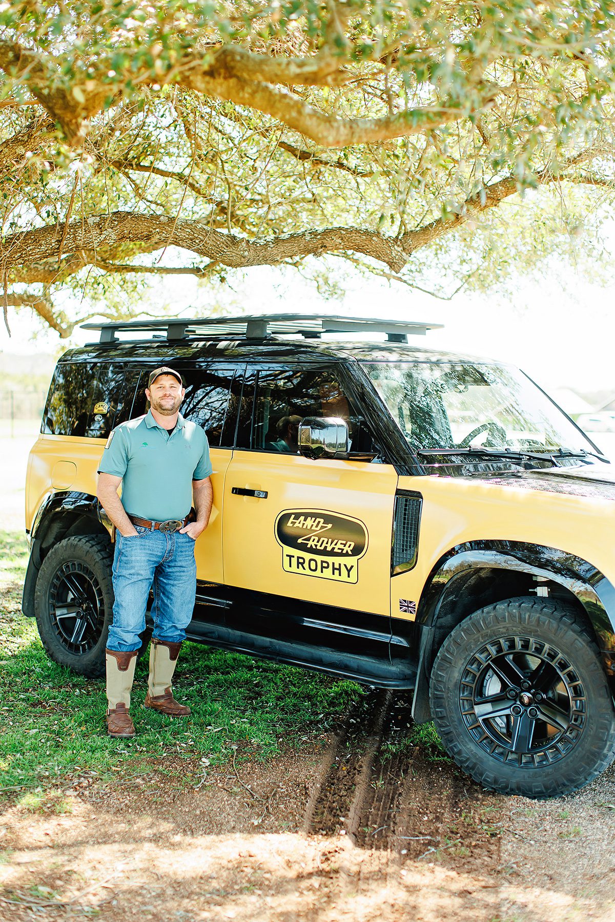Board Certified Master Arborist Kevin Belter with Arbor Care and Consulting in front of his Land Rover in Dripping Springs, Texas