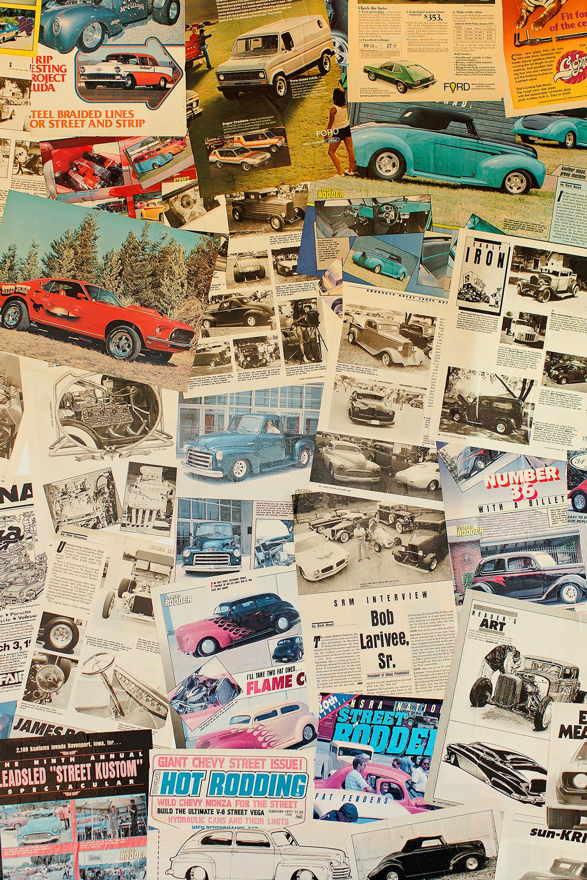 Modge podge wall of classic car magazines at Speeding Springs in Dripping Springs, Texas