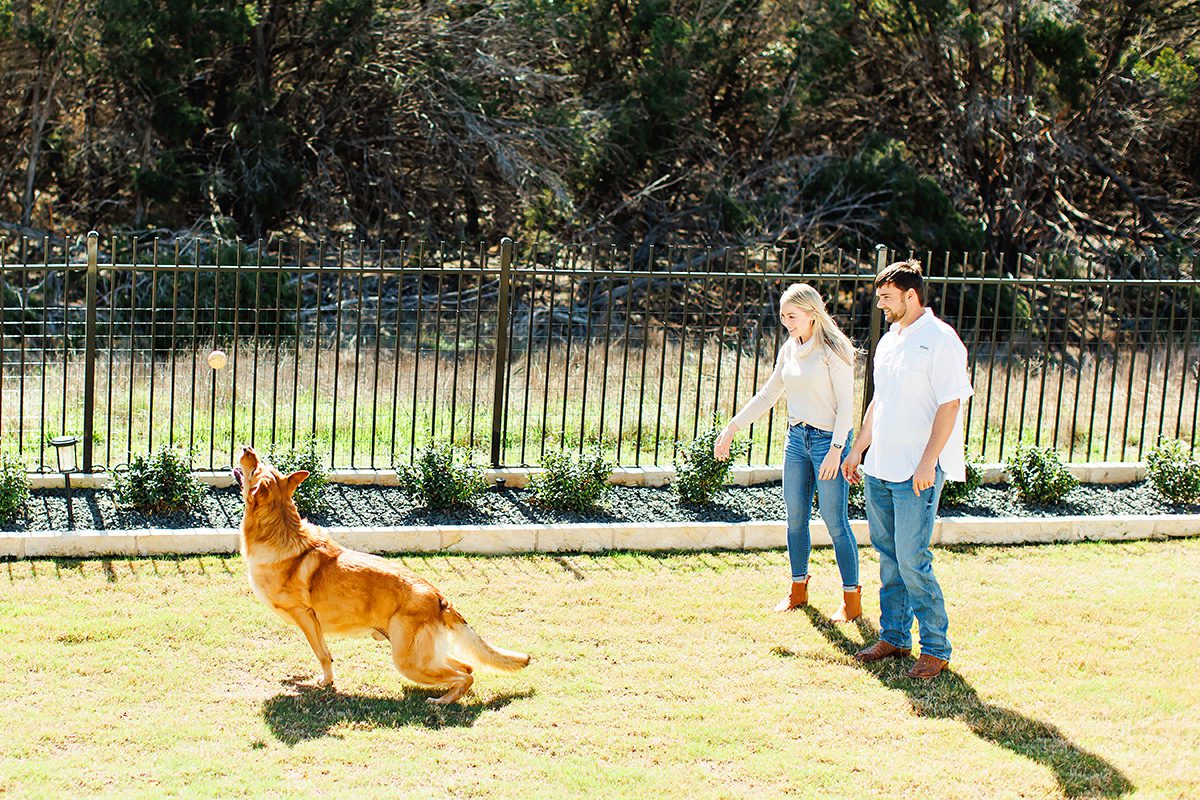 Shelby and Tim Odell in Dripping Springs, Texas with their dog Shiner