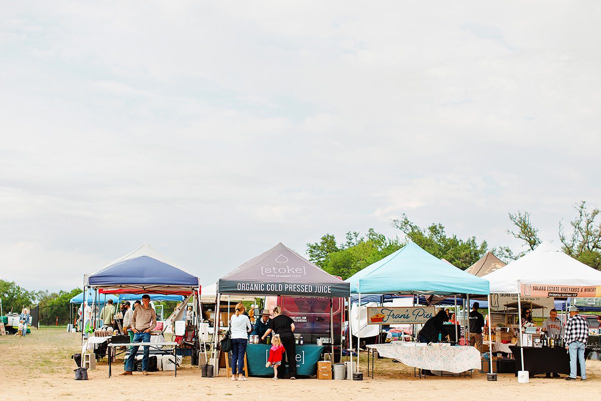 Dripping Springs Farmer's Market vendor booths at Founder's Park