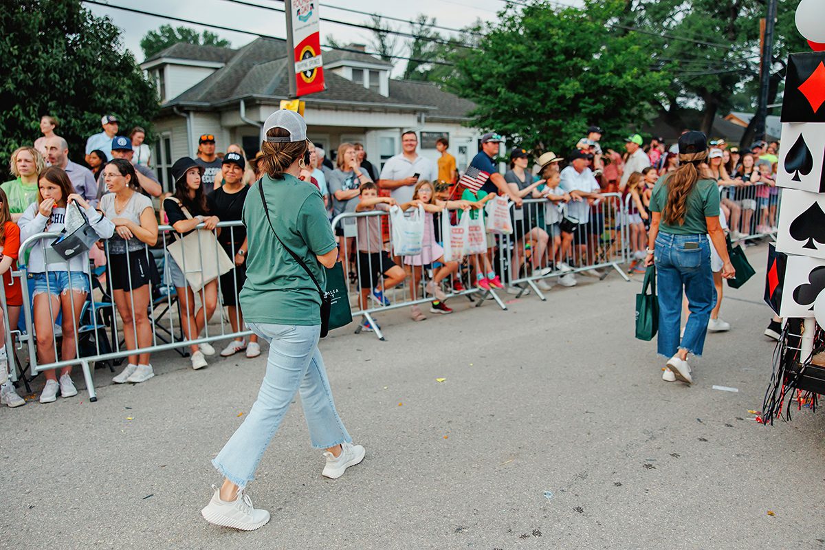 Best Real estate broker in Dripping Springs Magnolia Realty Austin Hill Country Founders Day 2025 float parade walk with Lauren Clark